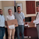 “Fermín Rojas Noesí hace entrega de Laptop para ganadores al Mérito Estudiantil de la universidad Autónoma de Santo Domingo (UASD)”